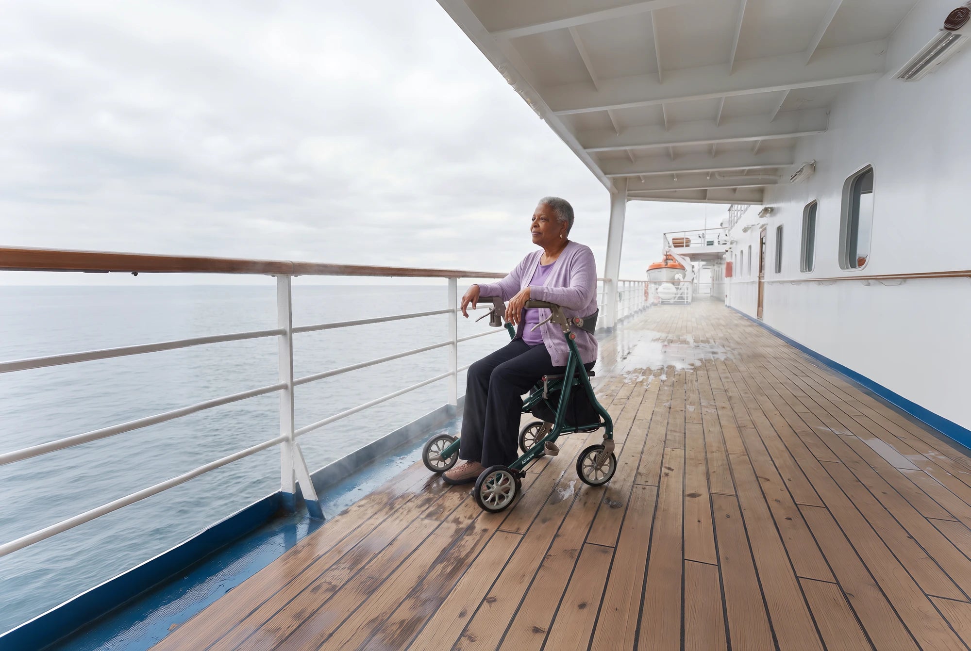 Woman resting on an Altacoo rollator on a cruise ship deck