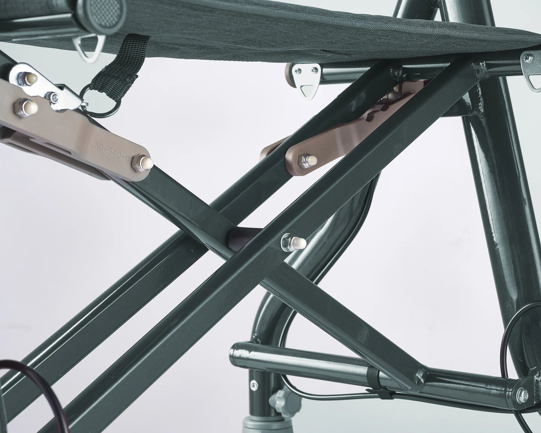 Close view of the green rollator cross-frame and seat supports