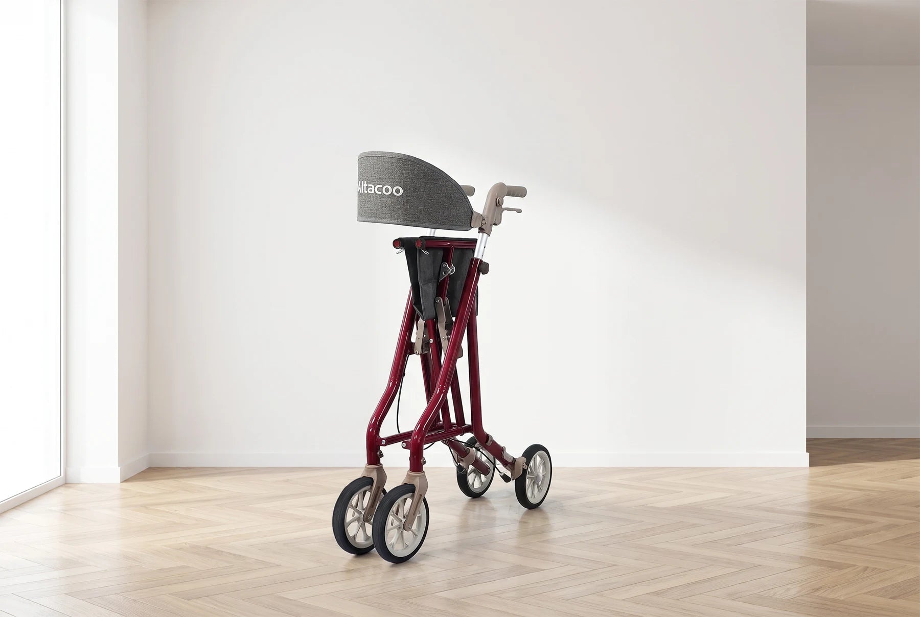 Red Altacoo rollator folded upright, all wheels visible