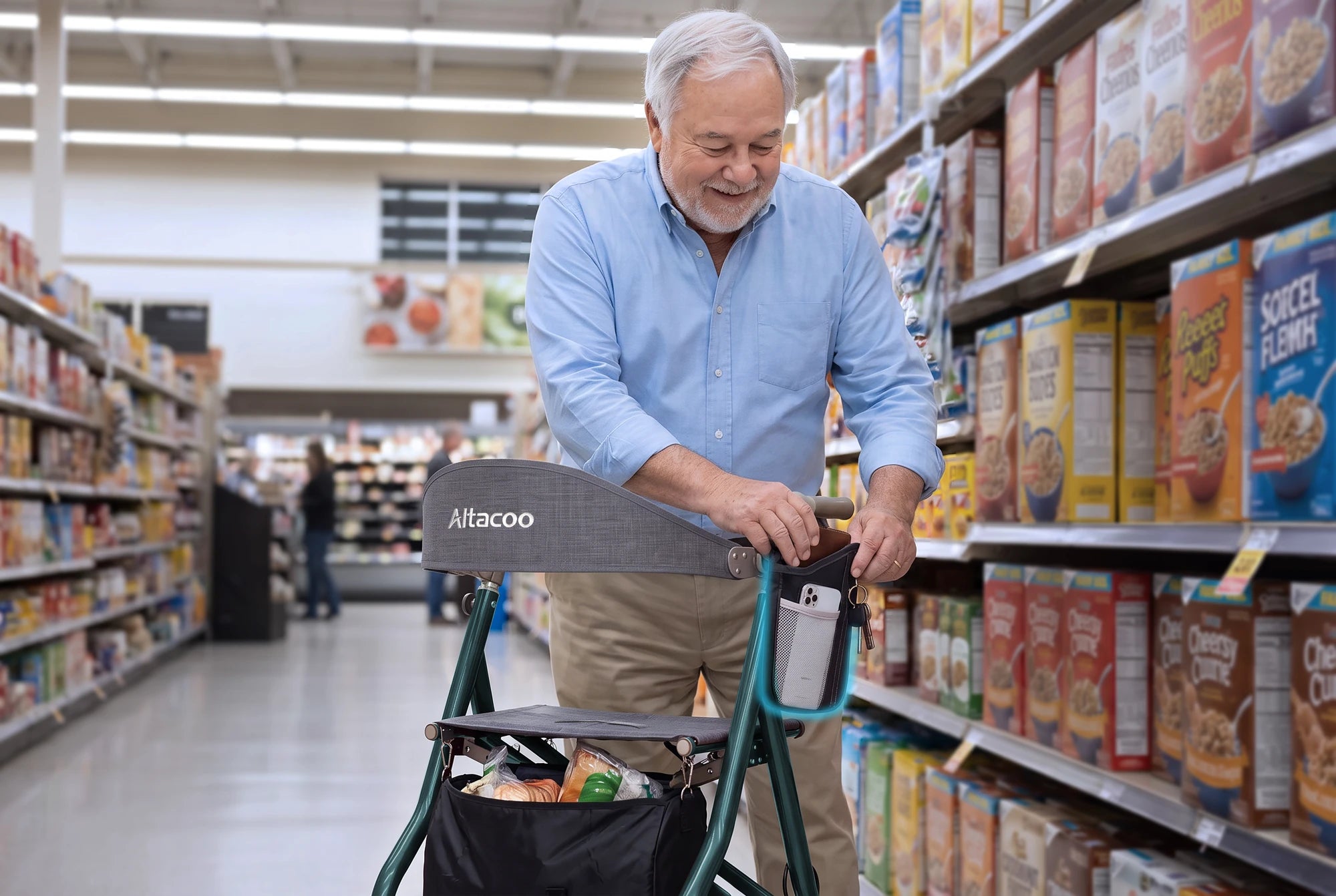Side pouch holding a phone and keys, with groceries in the large storage bag